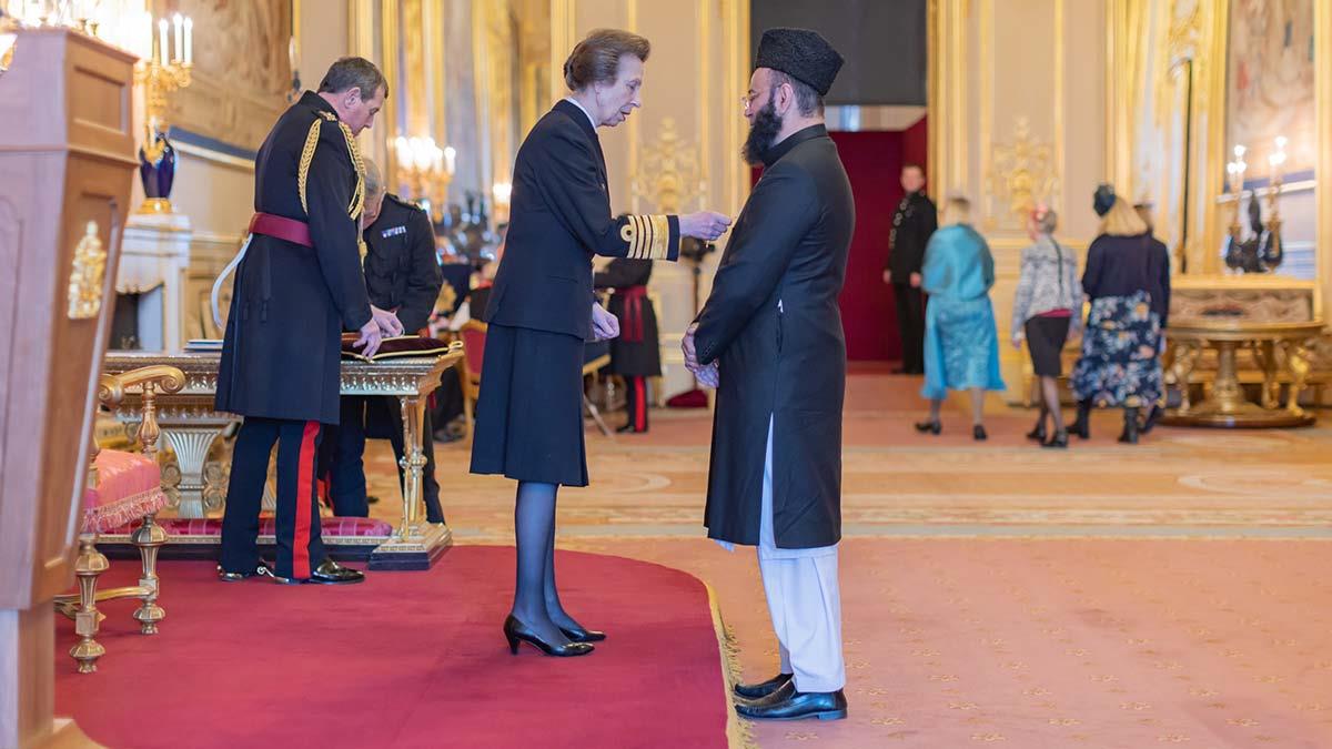 Imam Mohammad Asad was presented with his MBE by the Princess Royal at Windsor Castle.