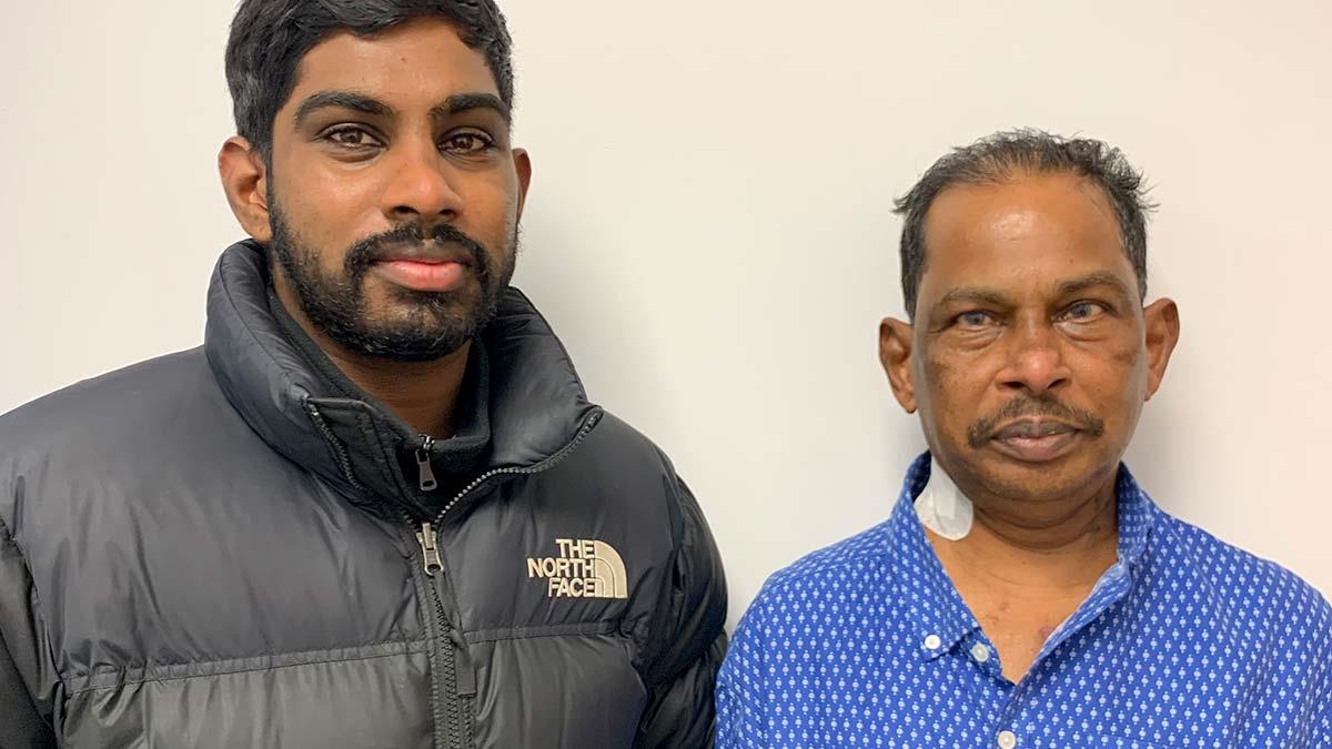 Queen Elizabeth Hospital Birmingham's 1,000th heart transplant patient Sarvan Kanagaratnan (right) with son Niro.