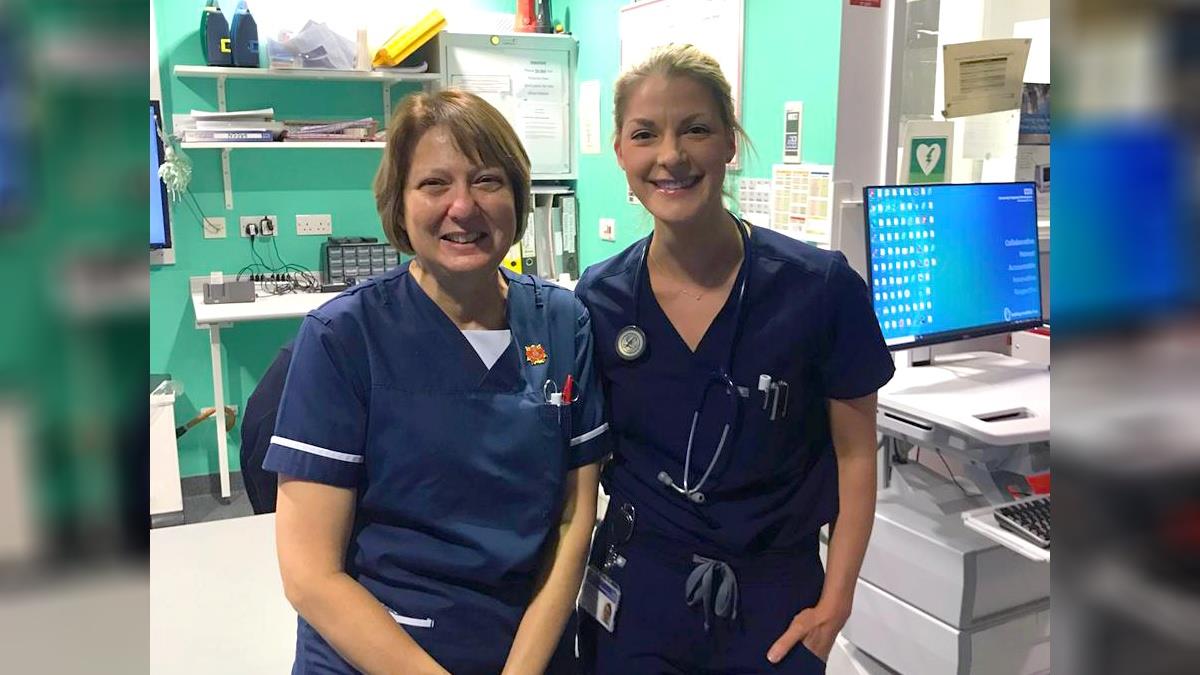 Twin's emotional reunion with former midwife