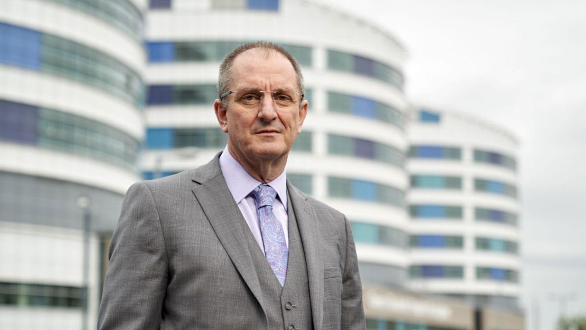 Professor Dave Rosser outside Queen Elizabeth Hospital Birmingham