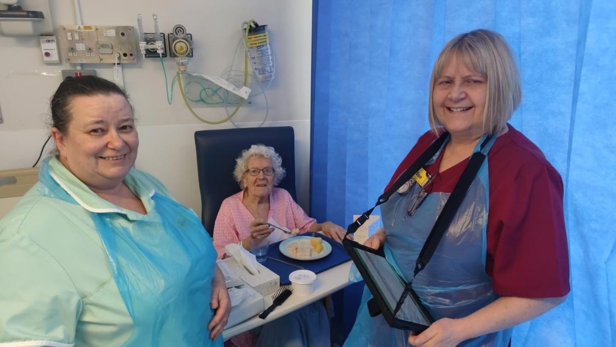 Left to right: Alison Pilcher, catering hostess, patient Ione Hartland and Sue Cartwright, ward services coordinator.