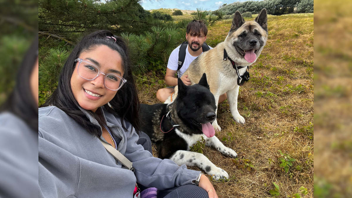Chris and his partner with their two dogs