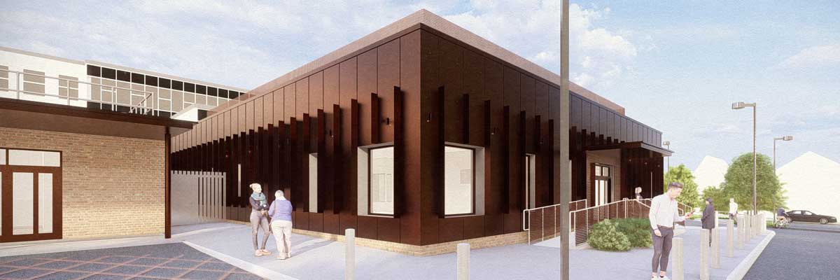 Main entrance area featuring improved access routes and a welcoming public approach to the new facility